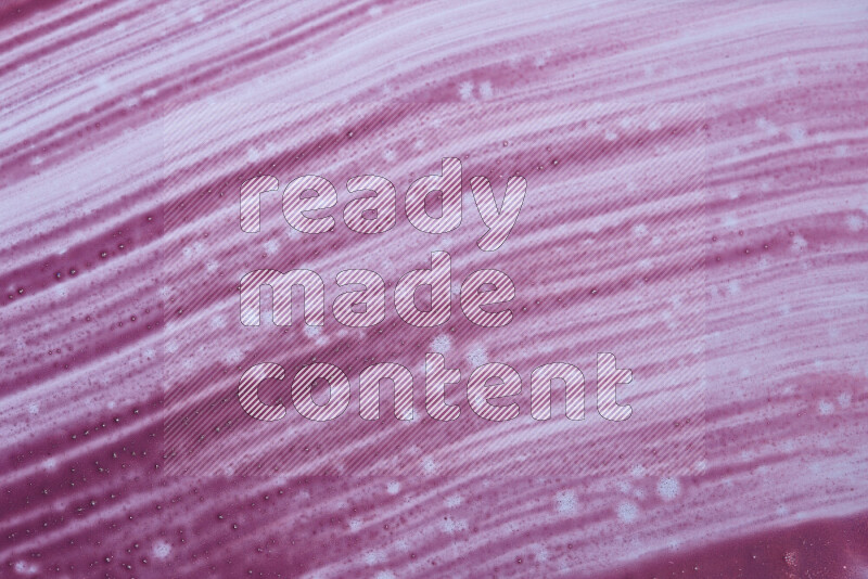 Close-ups of abstract purple paint texture in different shapes