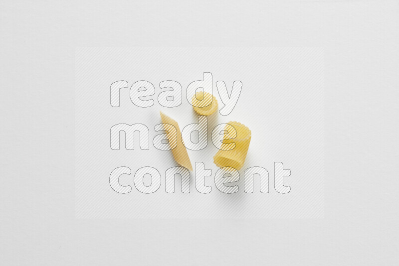 Different pasta types on white background