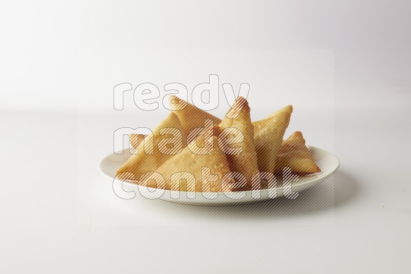 sambosas on a white background