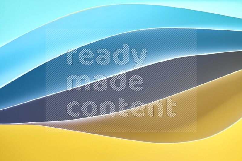 This image showcases an abstract paper art composition with paper curves in blue and yellow gradients created by colored light