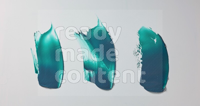 Turquoise painting knife strokes on white background