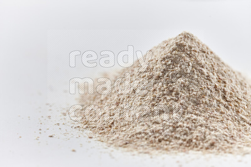 A bunch of onion powder on white background