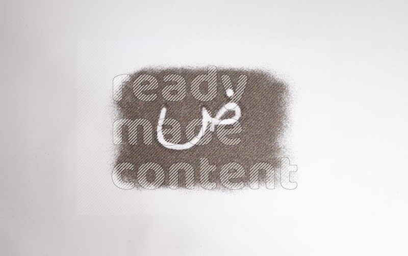 Arabic alphabets written with glitter on white background