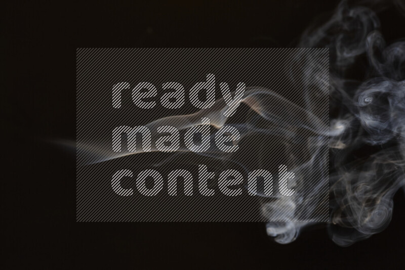 Motion of wavy smoke isolated on dark background