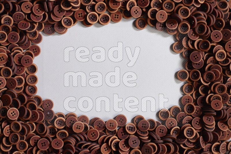 Wooden buttons placed on grey background