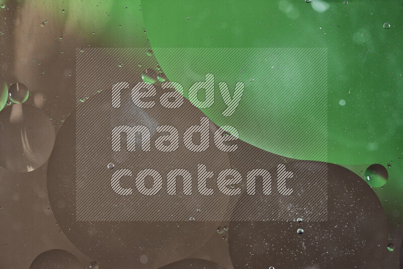 Close-ups of abstract oil bubbles on water surface in shades of green and brown