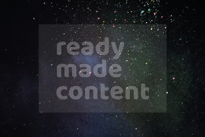 Colorful powder explosion on black background