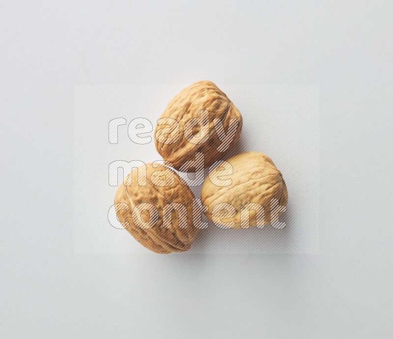 Top-view shot of walnut on white background