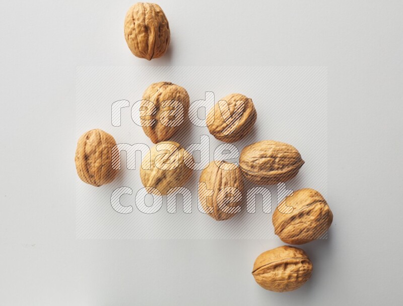 Top-view shot of walnut on white background