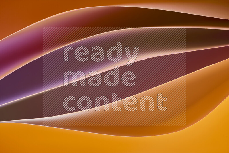 This image showcases an abstract paper art composition with paper curves in different warm gradients created by colored light
