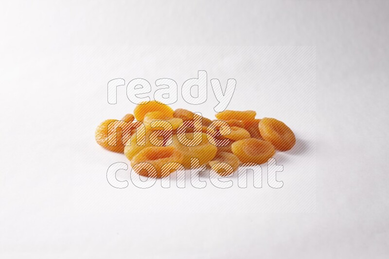 Dried apricots on white background