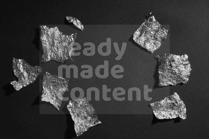 Aluminium foil on black background