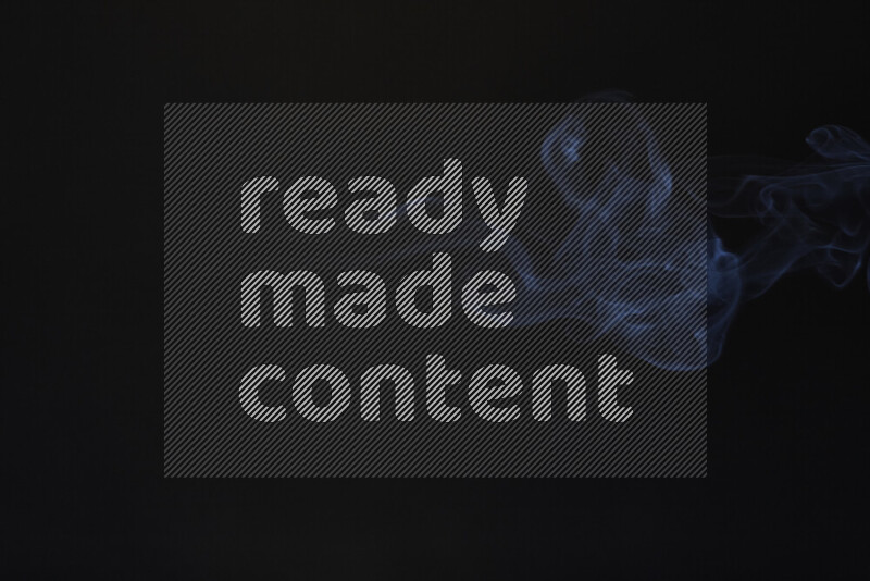 Motion of wavy smoke isolated on dark background