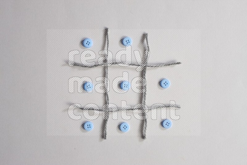 Blue buttons placed on grey background