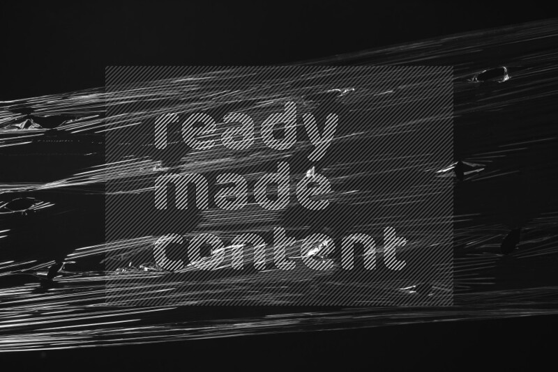 Plastic wrap texture on black background