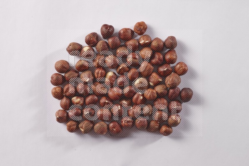 Hazelnuts on white background