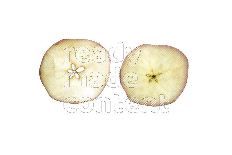 Apple slices on illuminated white background