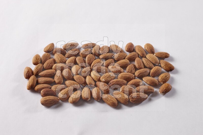 Almonds on white background