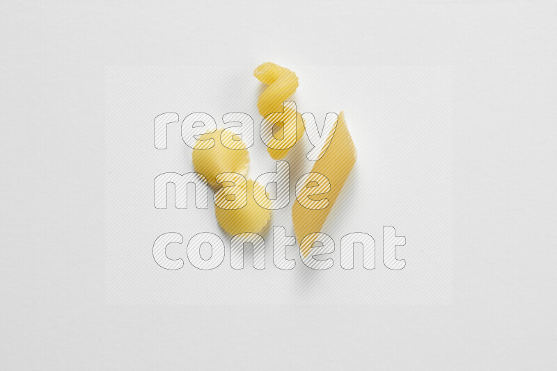 Different pasta types on white background