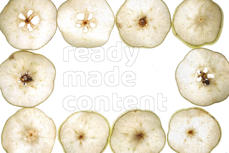 Pear slices on illuminated white background