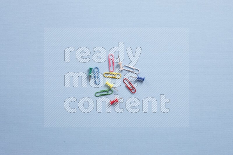 Different school supplies on blue background