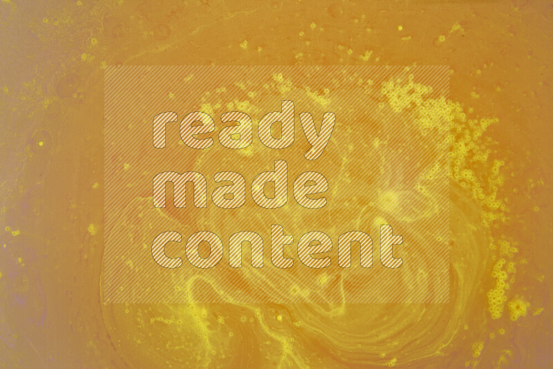 The image captures a dramatic splatter of yellow paint over a white backdrop