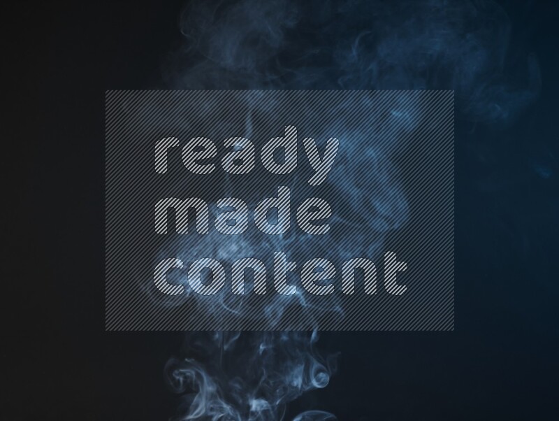Heavy smoke in blue isolated on black background