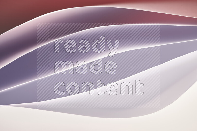 هذه الصورة تعرض تكوين فن الورق التجريدي مع منحنيات ورقية باللون الأبيض ودرجات دافئة مختلفة المكونه بواسطة الضوء الملون