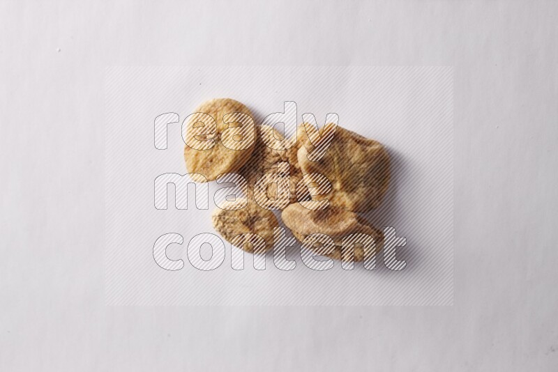 Dried figs on white background