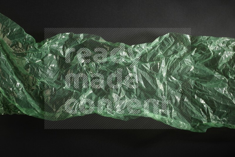 Colored plastic textures on black background