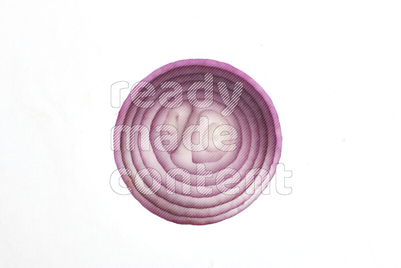 Onion slices on illuminated white background