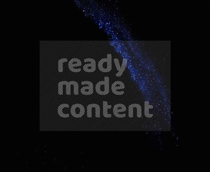 Blue glitter powder isolated on black background