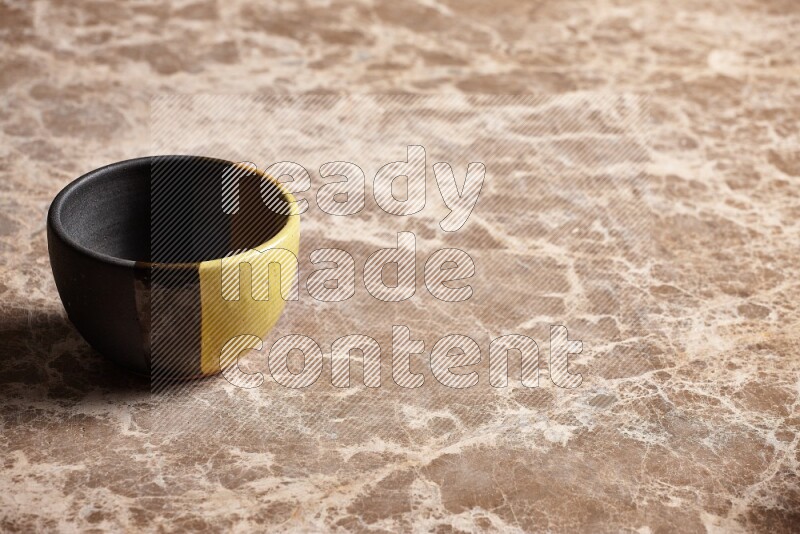 Multicolored Pottery Bowl on Beige Marble Flooring