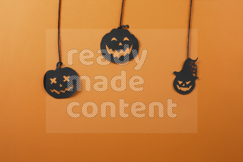 Halloween hand crafts on orange background
