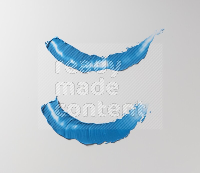 Blue curved painting knife strokes on white background