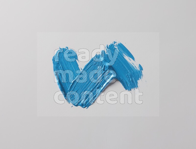 Multi blue straight brush strokes in different shapes on a white background