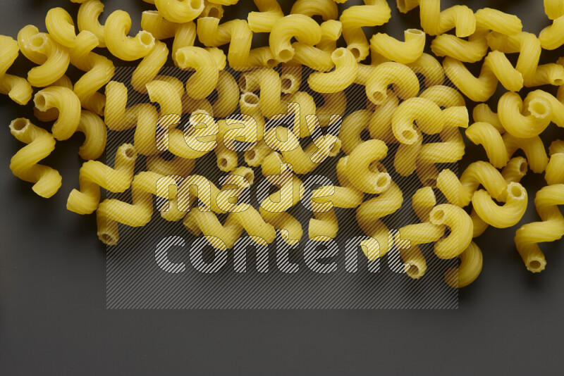 Twist pasta on grey background