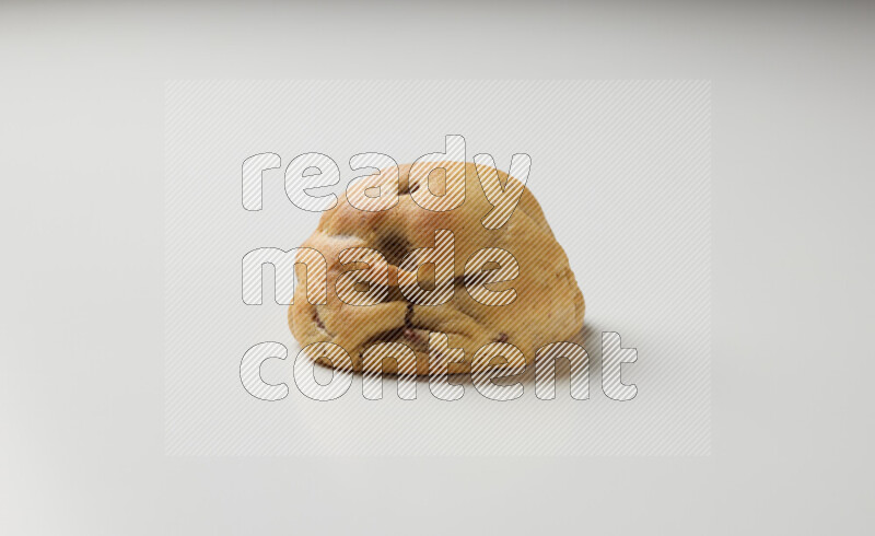 a chocolate chip cookie on a white background