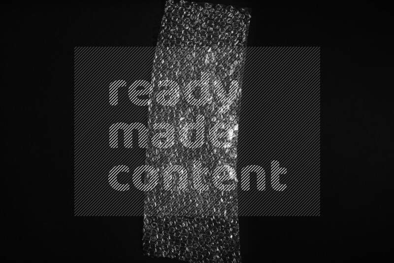 Bubble wrap texture on black background