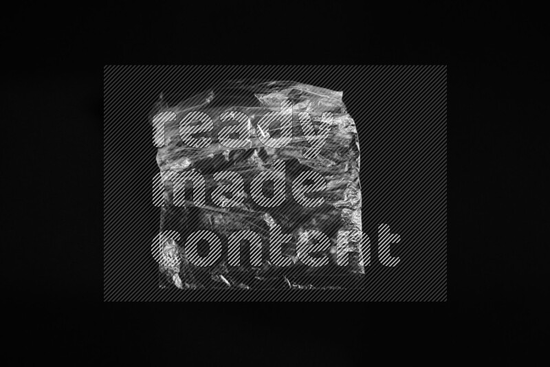 Transparent plastic textures on black background