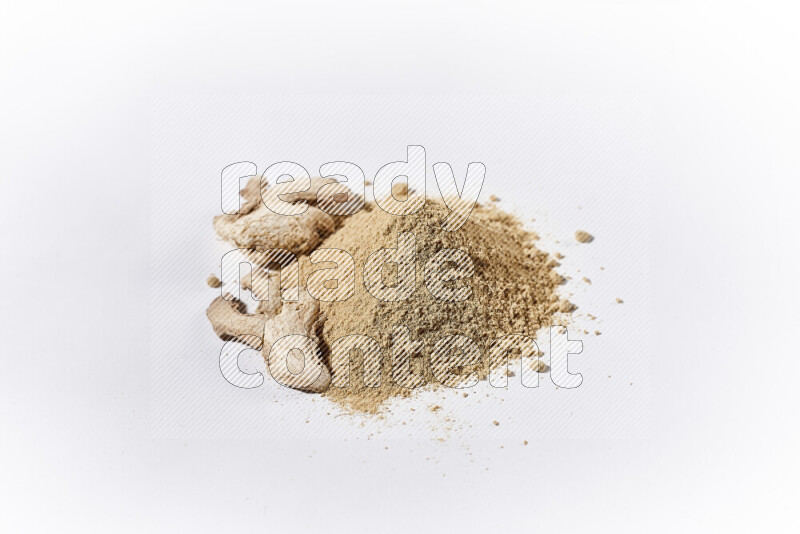 A bunch of ground ginger powder on white background