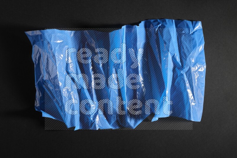 Colored plastic textures on black background