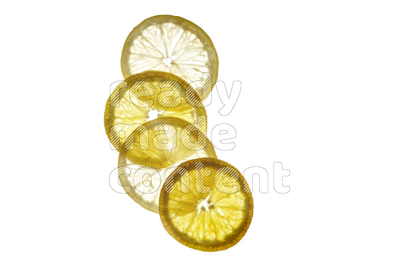 Mixed fruits slices on illuminated white background