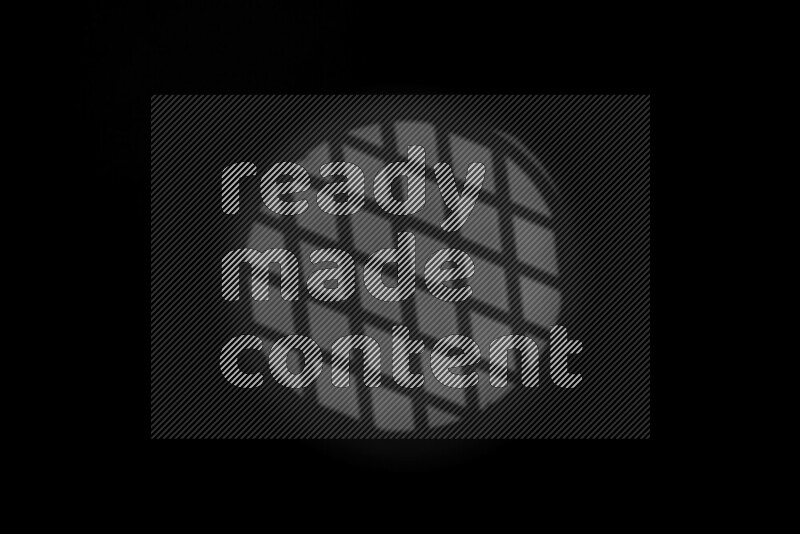 مجموعة من ضوء الغوبو الخافت تظهر أنماط هندسية علي سطح ناعم