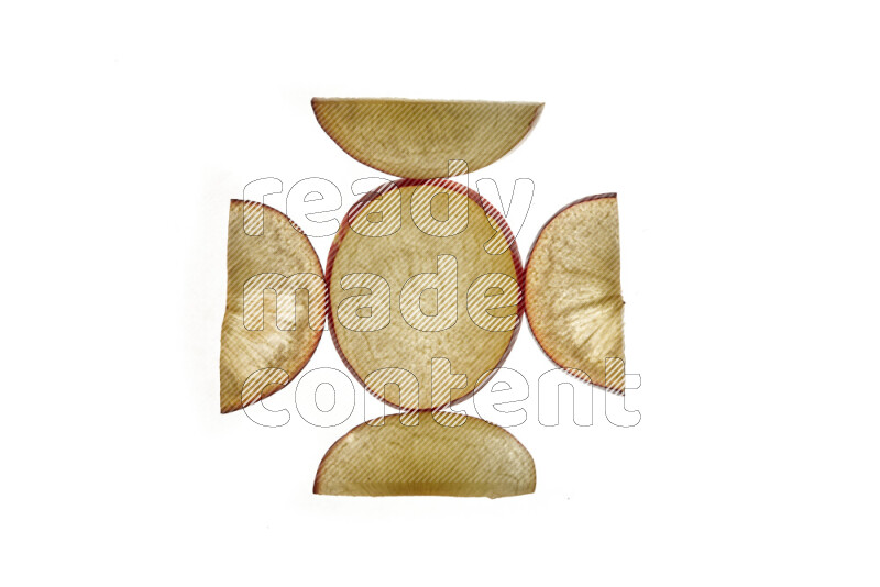 Plum slices on illuminated white background