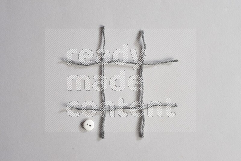 White buttons placed on grey background