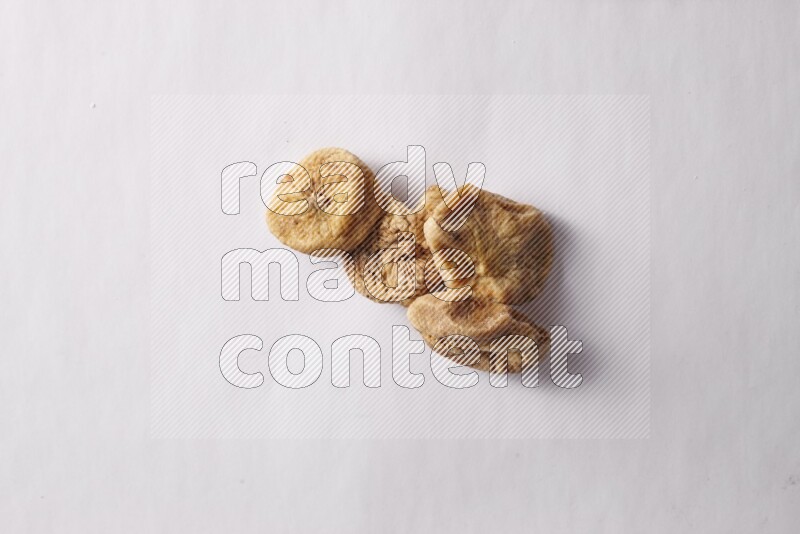 Dried figs on white background