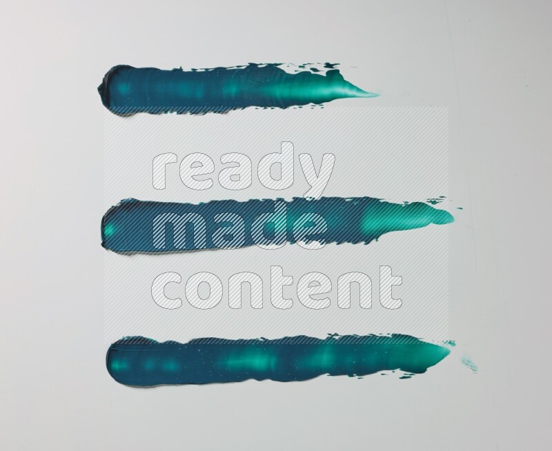 Turquoise painting knife strokes on white background
