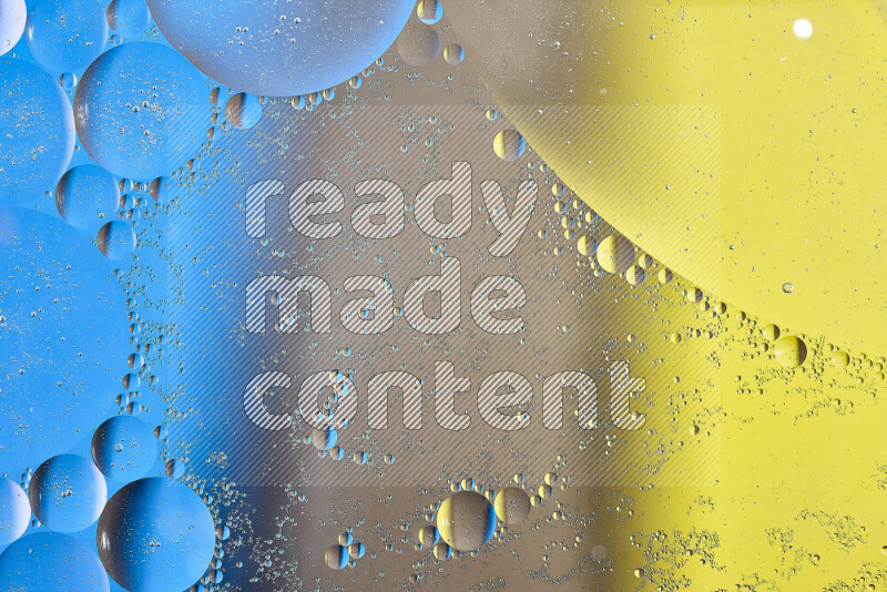 Close-ups of abstract oil bubbles on water surface in shades of yellow, brown and blue