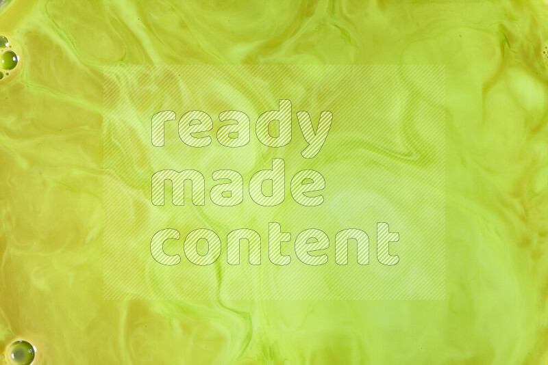 A close-up of abstract swirling patterns in green gradients